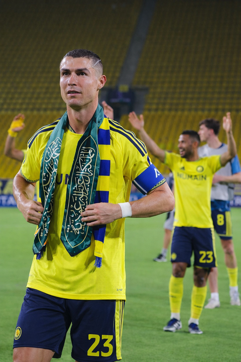 Cristiano Ronaldo celebrates Al Nassr’s AFC Champions League win with Saudi flag scarf