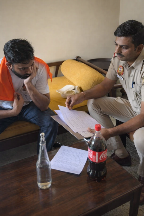 "Hang me" shouts Abhijeet Dipke as Delhi Police arrive at his house to warn him against the rally