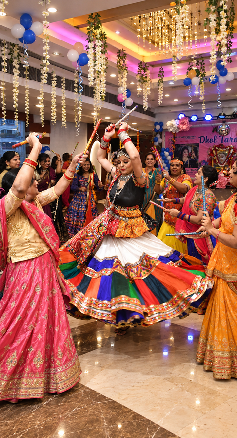 Why do devotees sing and clap during Navratri Garba, to invoke Goddess Durga’s power?