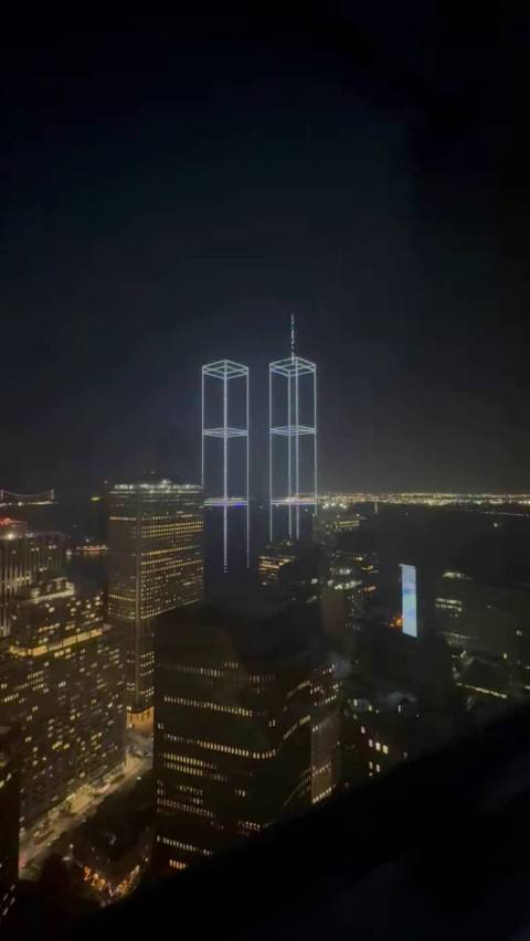 Drones trace the Twin Towers over New York Harbour