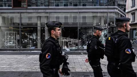 France sees 1,800 arrests as violent protests spread across the country